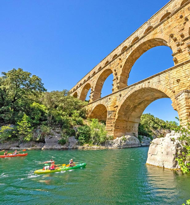 Scenic guests kayaking at Pont Du Gard, France