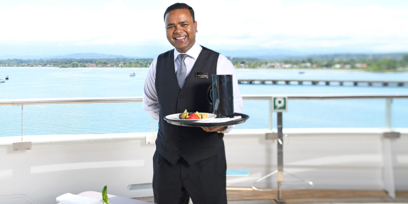 Butler Serving Breakfast on Scenic Eclipse